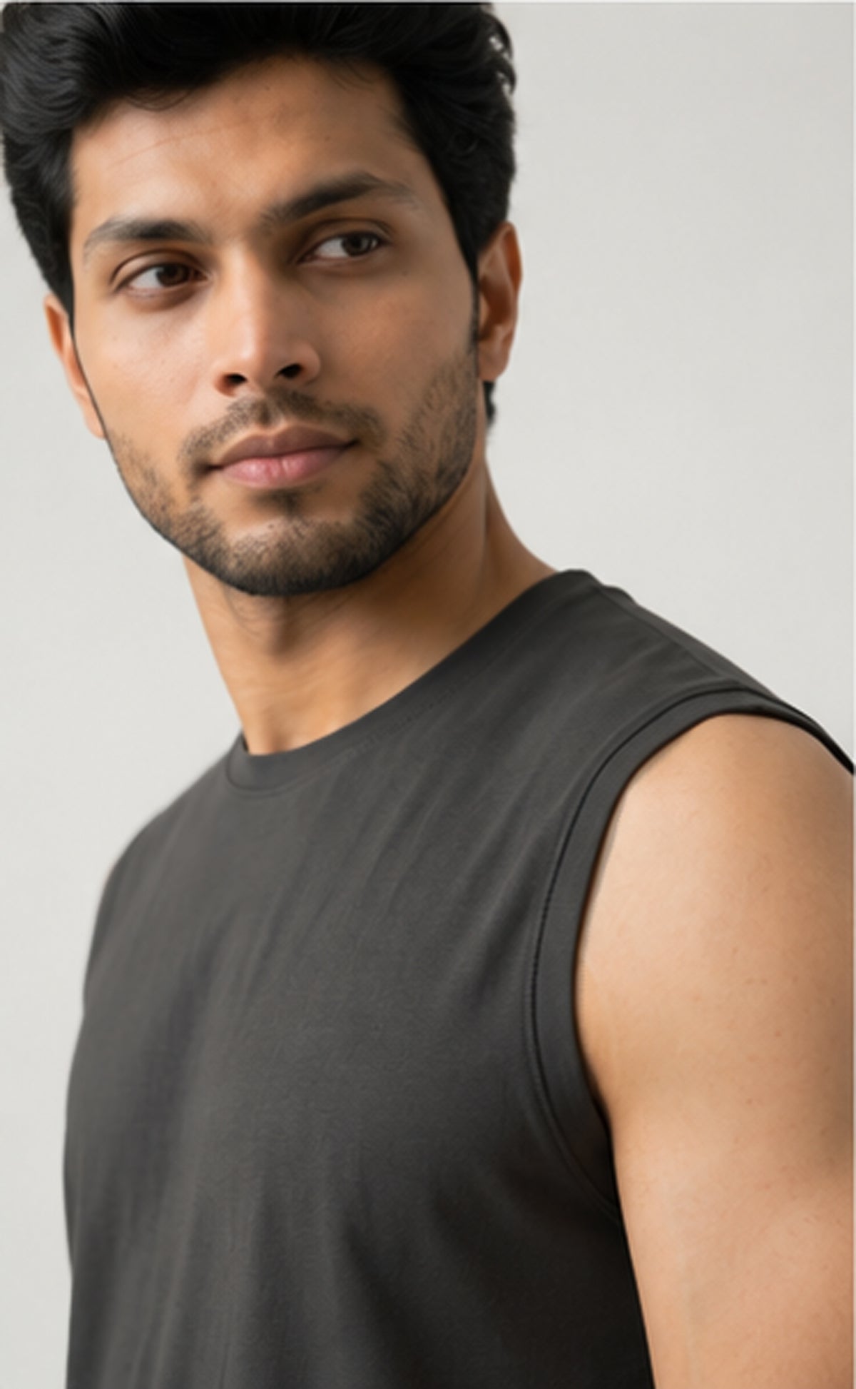 A Softsleep Airknit sleeveless tee in charcoal for men, crafted from bamboo cotton to deliver a soft feel for everyday loungewear.