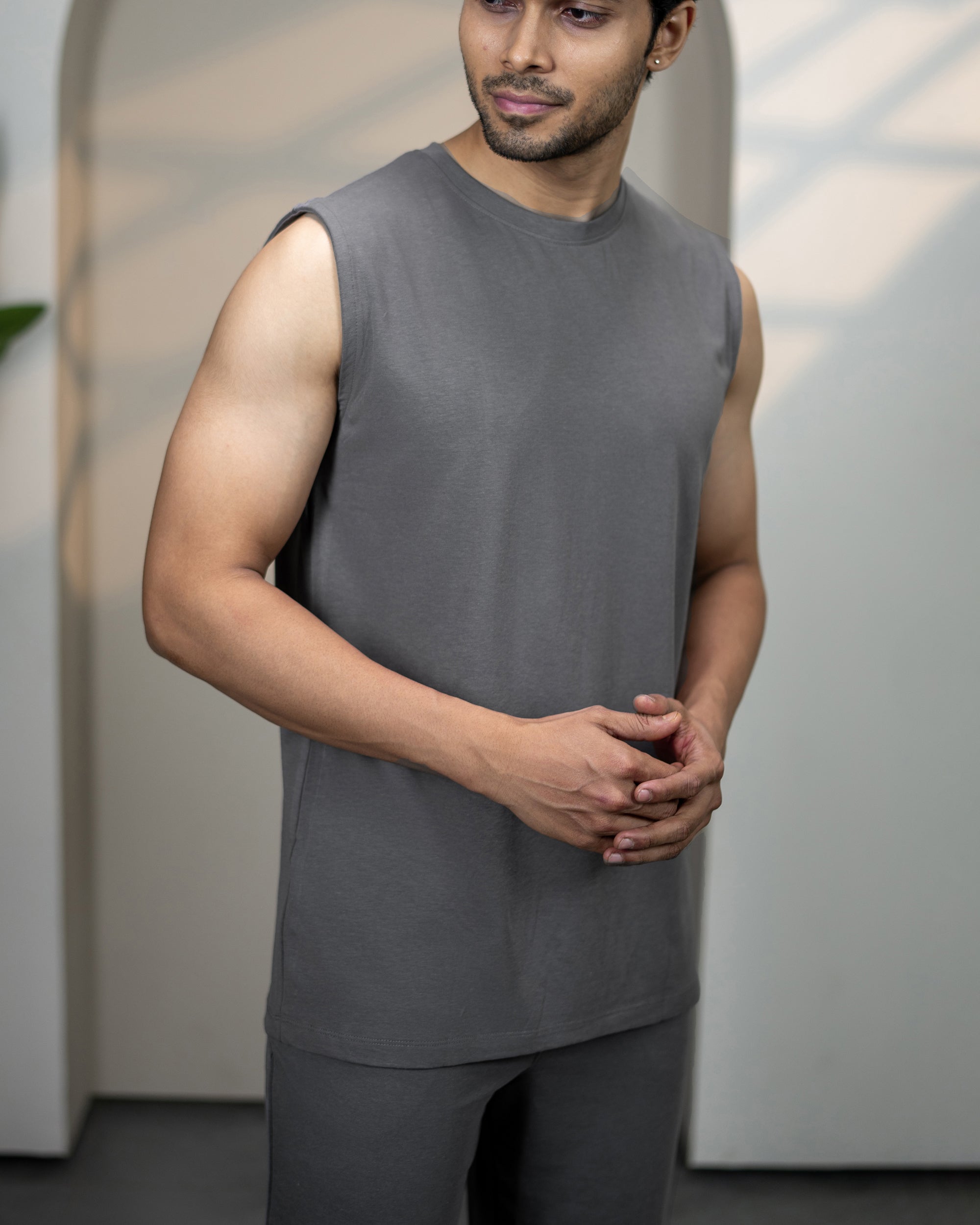Stone Grey Airknit sleeveless tee for men from Softsleep, offering a lightweight bamboo feel and easy comfort throughout the day.