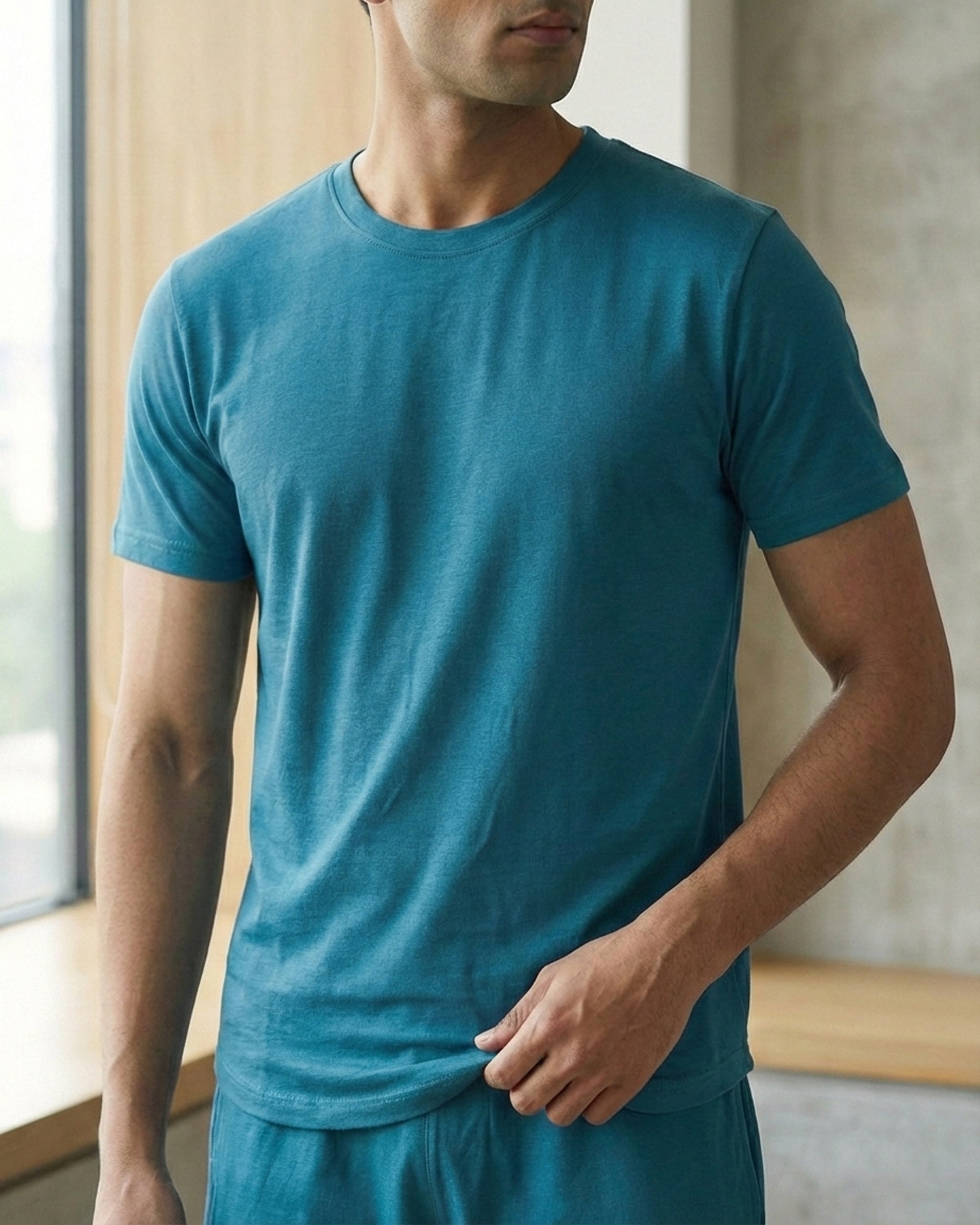Men's Teal Blue Cosmo tee from Softsleep, styled with regular sleeves and a soft bamboo touch for effortless daily comfort.